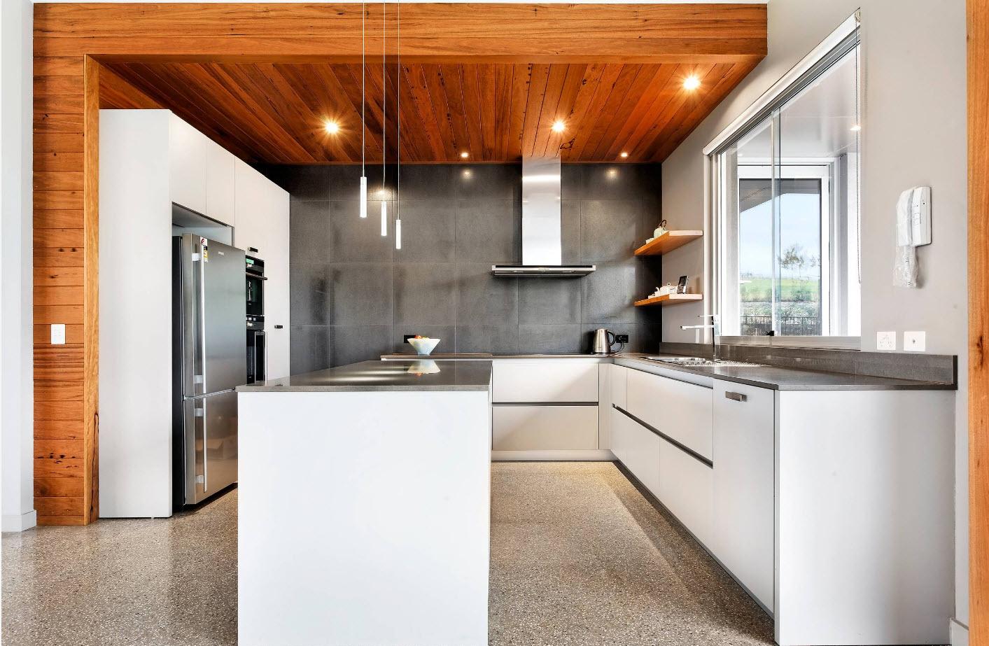 Сочетание дерева, бетона и белого цвета на кухне